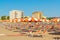 Umbrellas and chaise lounges on the beach of Rimini in Italy