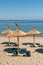 Umbrellas and seats on a beach