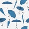Umbrellas set in various shapes. Blue umbrella seamless pattern. Stick umbrella.
