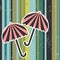 Umbrellas on stripey background