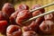 Umeboshi,Japanese salt plums on bamboo basket.Traditional Japanese food.Close-up view.