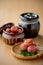 Umeboshi. Japanese salt plums and Umeboshi jar. Traditional Japanese food.