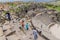 UMM QAIS, JORDAN - MARCH 30, 2017: Tourists visit the West Theatre ruins in Umm Qa