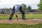 Umpire cleaning home plate