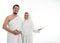 Umrah couple presenting copyspace