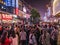 Unacquainted street performers singing at huangxing walking street in Changsha city China.