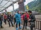 Unacquainted tour guide waiting For Bus to `Bailong` Glass elevator and Cable Car in Zhangjiajie National Forest Park