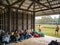 Unacquainted  trekkers waiting to pick them Bag from poster man on Phu Kradueng mountain national park in Loei City Thailand