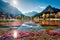 Unbelievable morning view of Jasna lake. Bright autumn scene of Julian Alps, Gozd Martuljek location, Slovenia, Europe. Wonderful