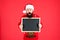 Unbelievable. Winter announcement. Chalkboard for information. Man hold blank blackboard copy space. Guy santa claus red
