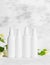 Unbranded skincare products plastic bottle with dispenser and flacons. Tube for cream shampoo. Green jasmine flowers and their