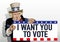 Uncle Sam presents a sign asking American voters to vote.