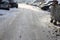 Uncleaned from snow, icy street. Slippery road in winter