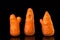 Uncommon vegetables. Ugly carrots on a black background