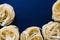 Uncooced italian pasta fettuccine on classic blue background with copy space