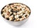 Uncooked assorted legumes in metal bowl isolated