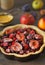 Uncooked autumn red fruit pie