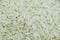 Uncooked Basmati rice close-up. Basmati rice texture, background