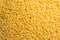 Uncooked Chifferi Rigati Pasta Background