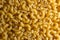 Uncooked Chifferi Rigati Pasta Background