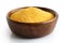 Uncooked cornmeal in dark wooden bowl.