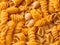 uncooked dry macaroni, italian pasta background