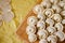 Uncooked dumplings lying on a cutting board