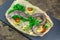 Uncooked eel fish, conger,parsley, salt and lemon - ingredients for cooking