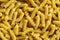 Uncooked fusilli pasta background