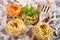 Uncooked Italian pasta in three colors