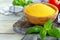 Uncooked Italian polenta in a wooden bowl