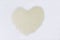 Uncooked Jasmine  rice heart shape for texture background