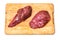 Uncooked Kangaroo meat steaks on cutting board