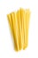 Uncooked mafaldine pasta. Raw long mafalda pasta isolated on white background