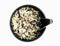 Uncooked mixed rice in black bowl with spoon