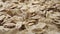 Uncooked oatmeal flakes texture close up.