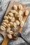 Uncooked potato gnocchi on cutting board. Tasty italian food