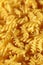 Uncooked raw pasta macaroni background