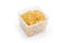 Uncooked seashells shaped pasta in plastic container on white background