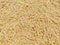 Uncooked Vermicelli pasta background made using refined floor wheat.
