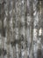Uncorked metallic texture. Silver structure pattern and background. Gray color corrugated metal sheet