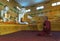 Undefined Monk pray at the Shwethalyaung Buddha on January 06, 2011