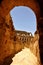 Under the arches of the amphitheater