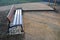 Under the bench are rectangles made of tiles. otherwise, the soft surface of the compacted gravel park path could erode the shoes