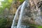 Under big jungle waterfall Giant Velikan tropical landscape of Abkhazia.