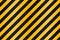 Under construction background. Black yellow diagonal stripes