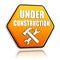 Under construction and tools sign yellow hexagon banner