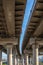 Under a double modern automobile overpass