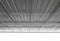 Under metal sheet roof corrugated metallic texture surface in new construction