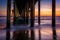 Under the pier at sunset, in Huntington Beach